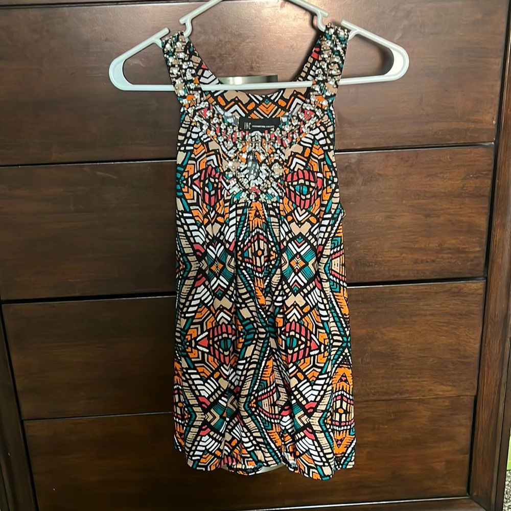 EUC dressy top with beaded neckline